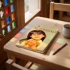 El libro del conocimiento para niños - Al Ghazali de Abu Hamid Al-Gazali (Algazel), sobre una mesa de madera con la sombra de una celosía