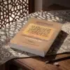 Tafsir al Qurtubi Tomo 3 de Imam al Qurtubi, sobre una mesa de madera con la sombra de una celosía